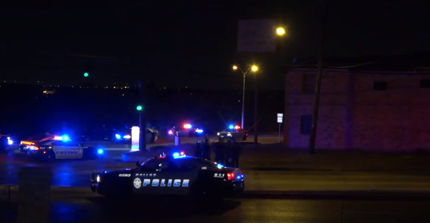 Dallas police at the scene of a fatal officer-involved shooting in which multiple officers...