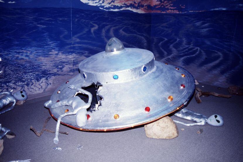 A display of a purported crashed saucer and alien bodies was on view at the Roswell UFO...