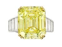 Heritage Auctions sold this fancy intense yellow diamond ring from the jewelry collection of...