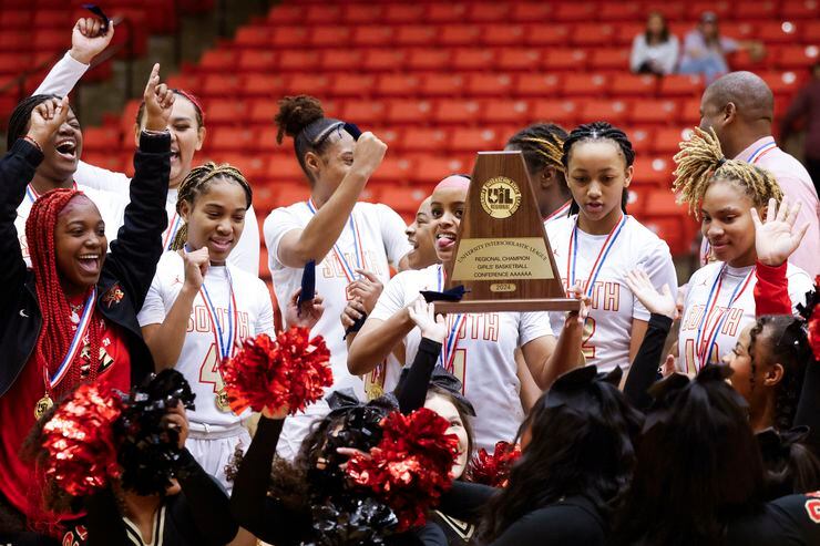 South Grand Prairie high players cheer following their victory against Boswell High in Class...