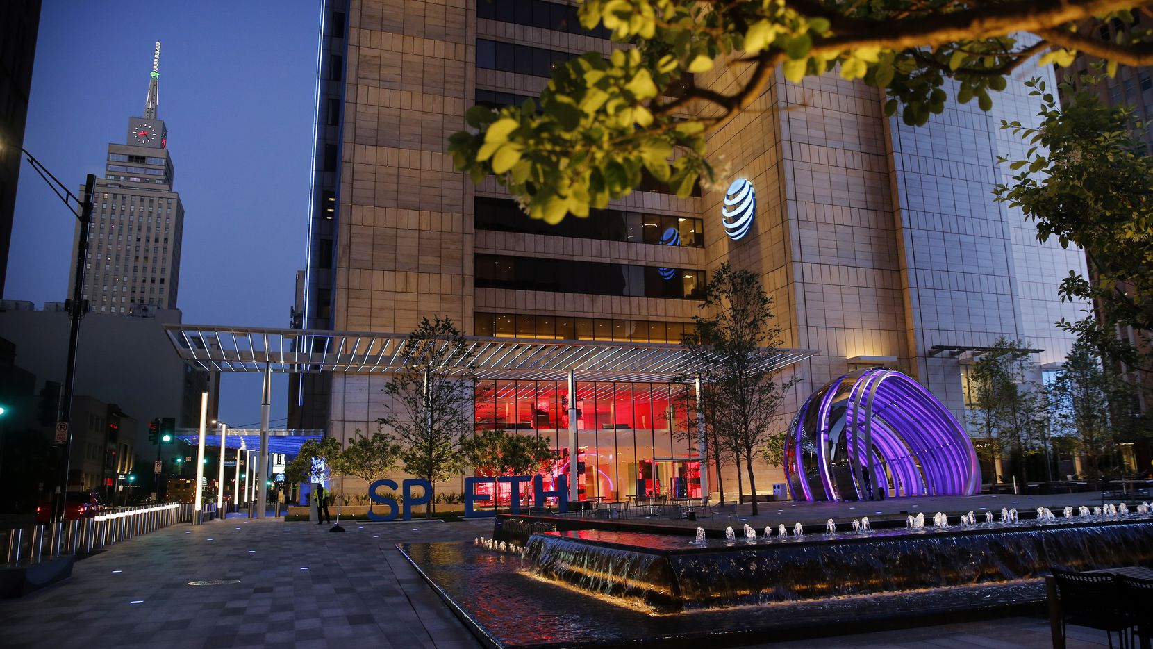 The AT&T Discovery District on Commerce Street in front of the company's downtown Dallas...
