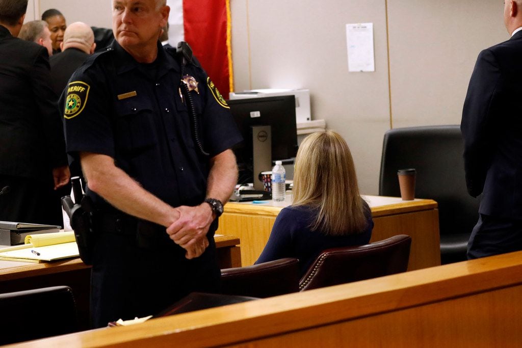 Amber Guyger sits alone in the courtroom after being found guilty of murder Tuesday.
