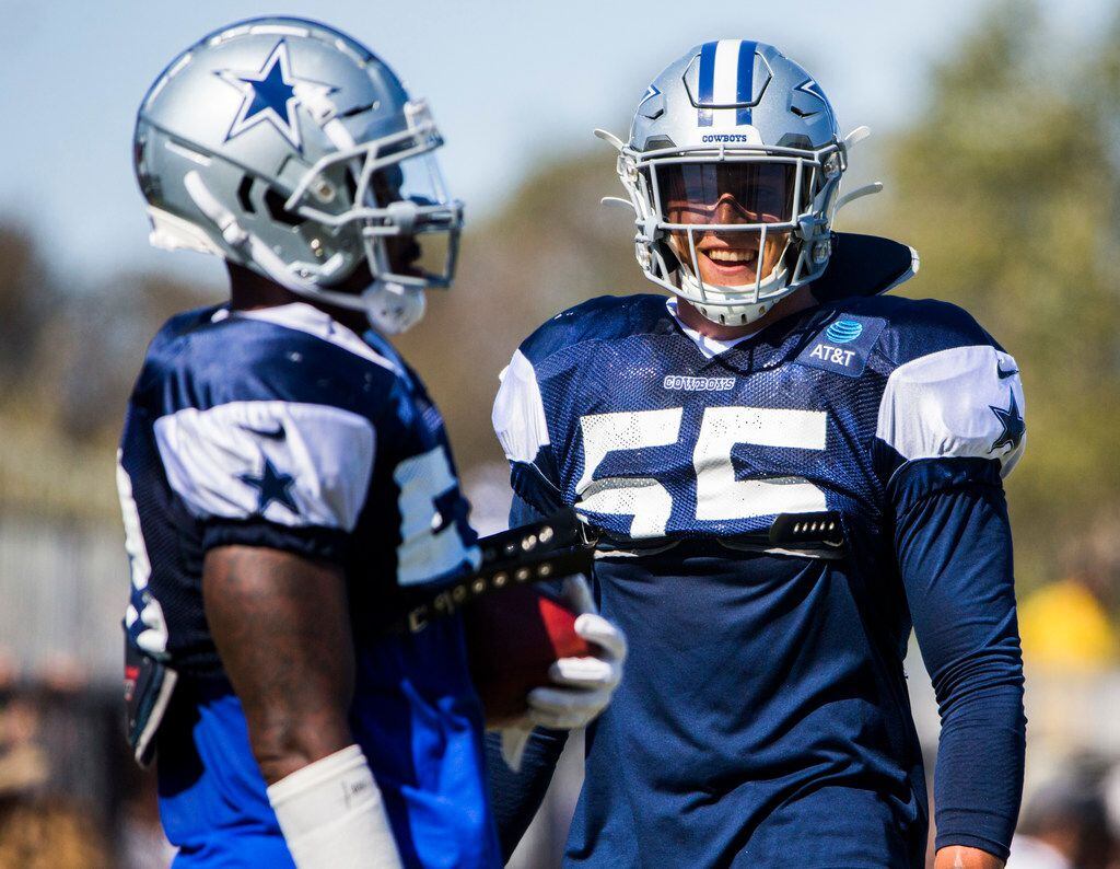 Dallas Cowboys outside linebacker Leighton Vander Esch (55) and middle linebacker Jaylon Smith (54) chat during an afternoon practice at training camp in Oxnard, California on Friday, August 2, 2019. (Ashley Landis/The Dallas Morning News)