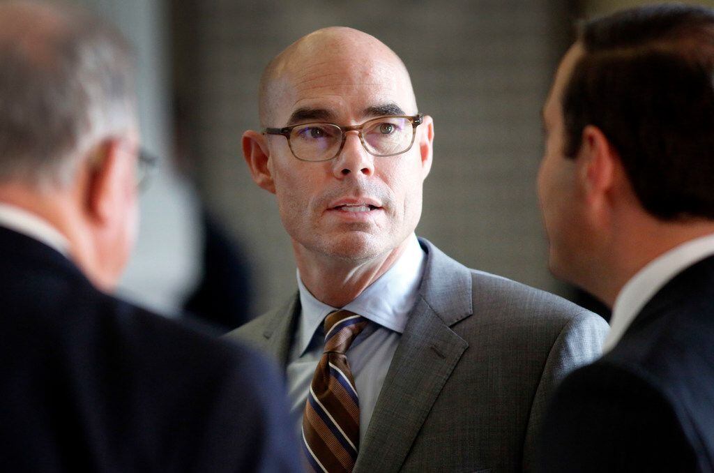 Texas Speaker of the House Dennis Bonnen visits with colleagues during the 86th Legislative...