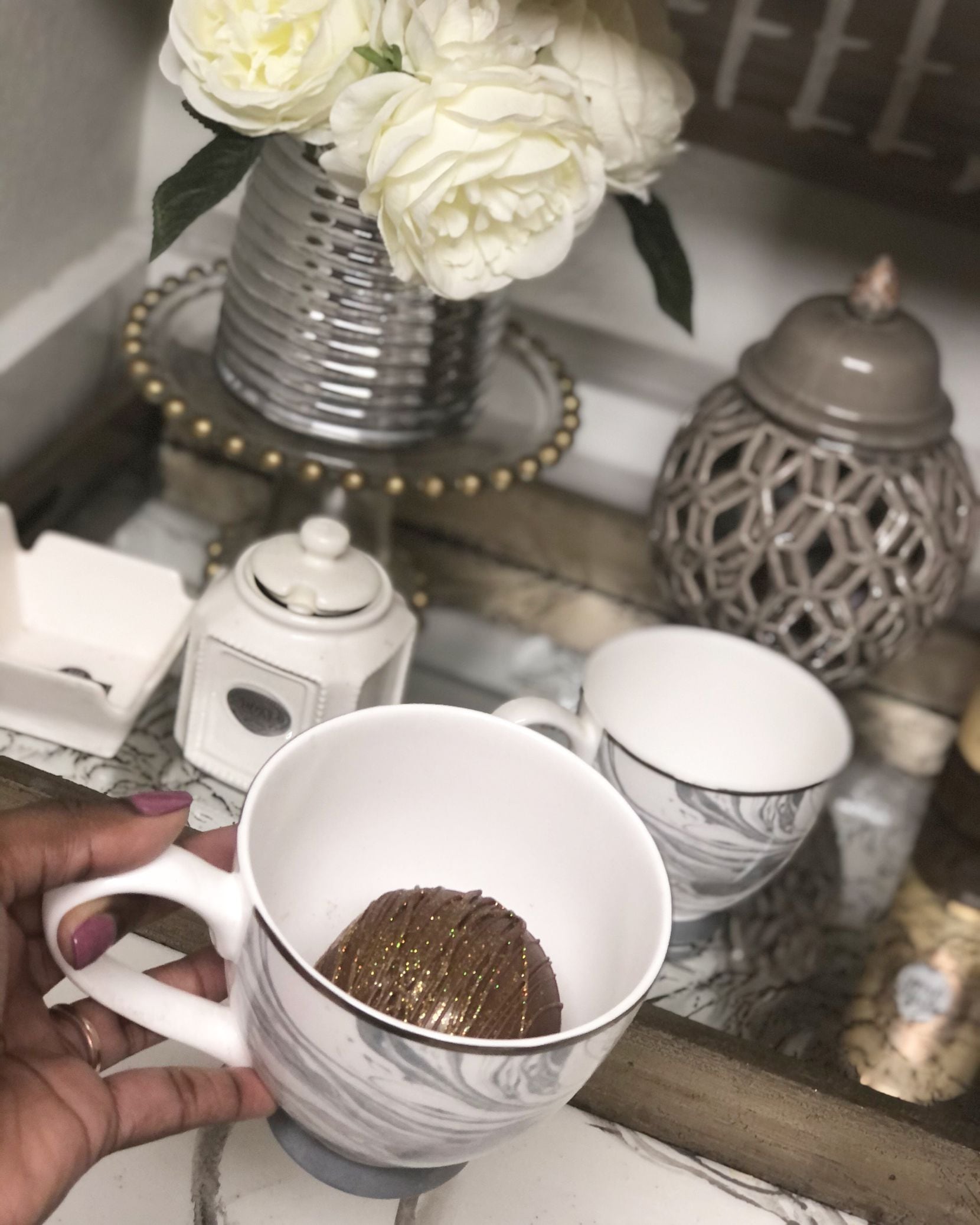 Chovani Wright from Jar Sweets makes hot cocoa bombs.