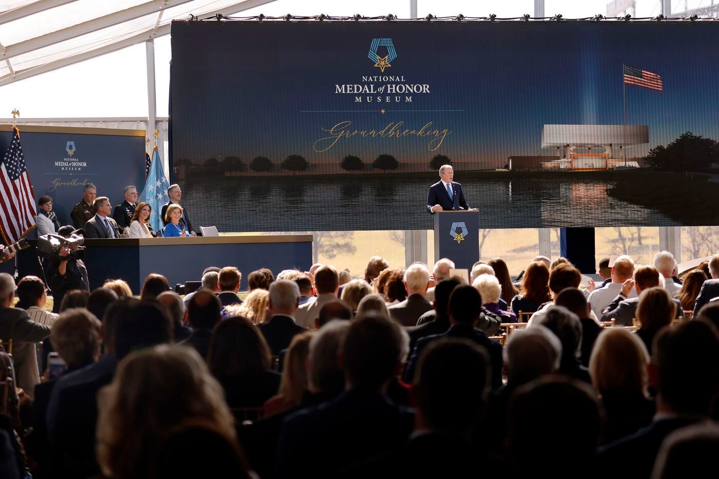 Former President George W. Bush speaks to those gathered for the groundbreaking ceremony of...