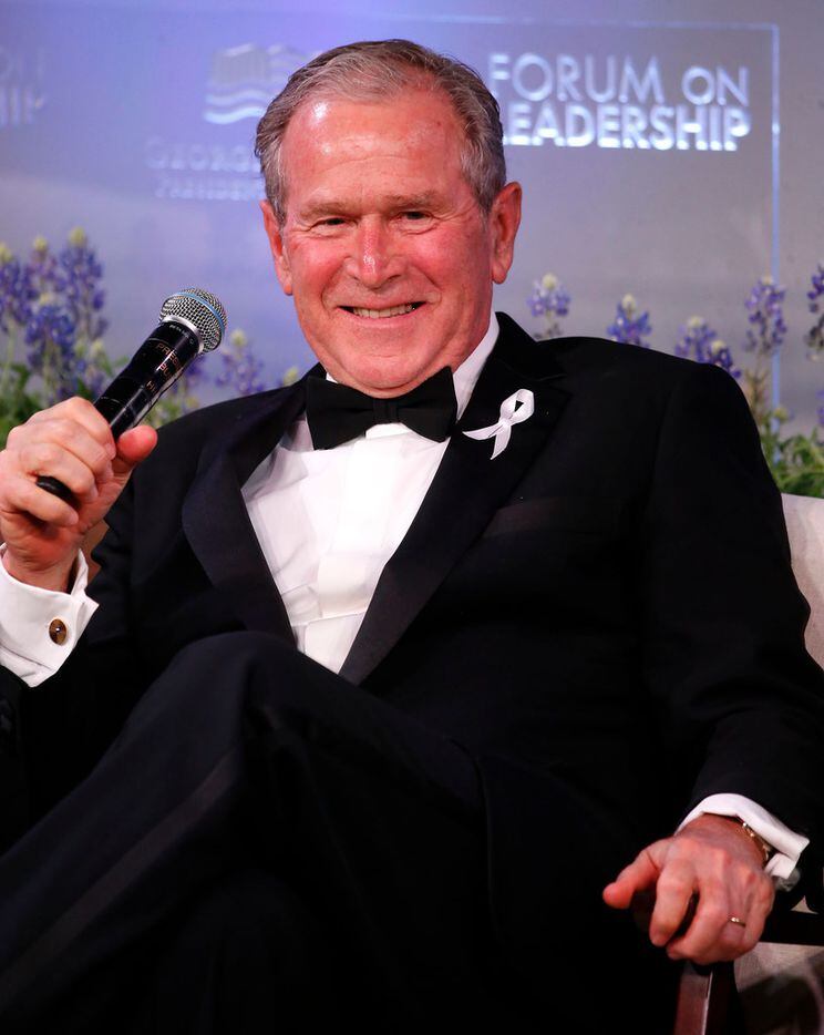 Former President George W. Bush smiles during the Conversation with President Bush and Bono...