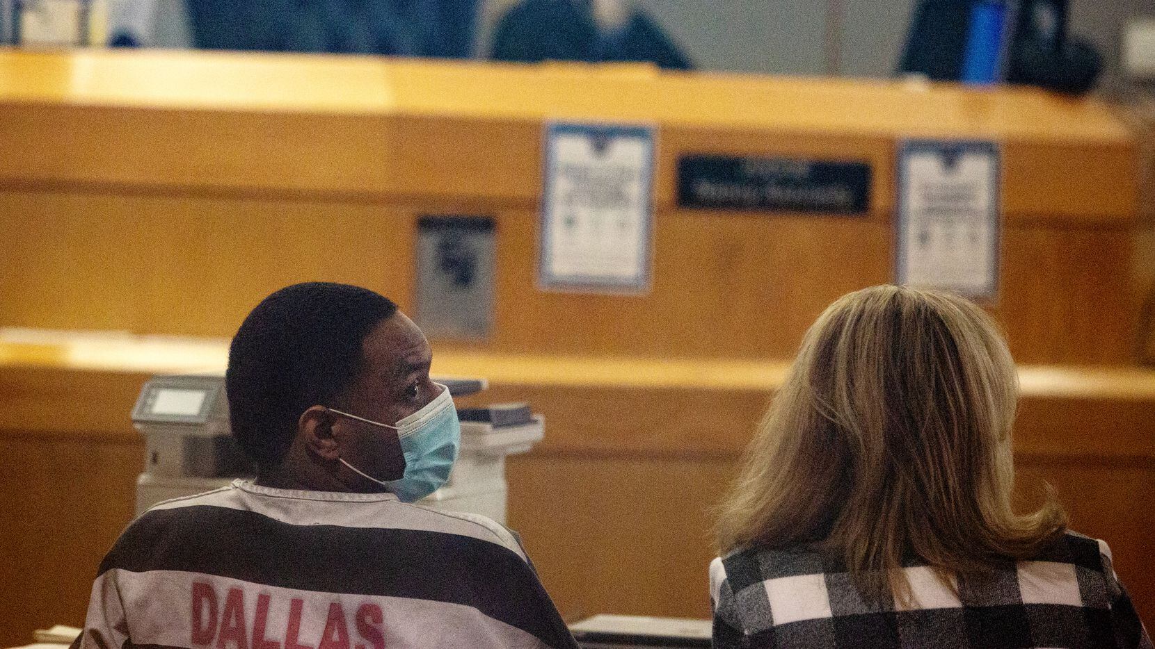 Reginal Knox looks into the court seating before the victim impact statements regarding...