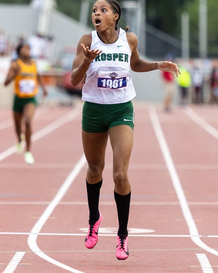 Lauren Lewis of Prosper reacts to winning the girls’ 400-meter dash at the UIL Track & Field...