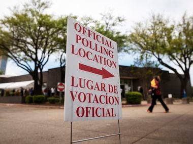 Signage marking an official polling location outside of the Oak Cliff Sub-Courthouse in Dallas during the first day of early voting, on Monday, April 19, 2021.
