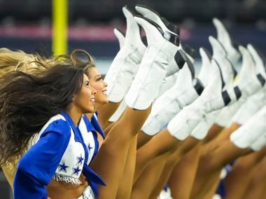 The Dallas Cowboys Cheerleaders perform before a preseason NFL football game against the Houston Texans at AT&T Stadium on Saturday, Aug. 21, 2021, in Arlington.