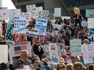 Thousands showed up to protest for immigrant and refugee communities in downtown in front of...