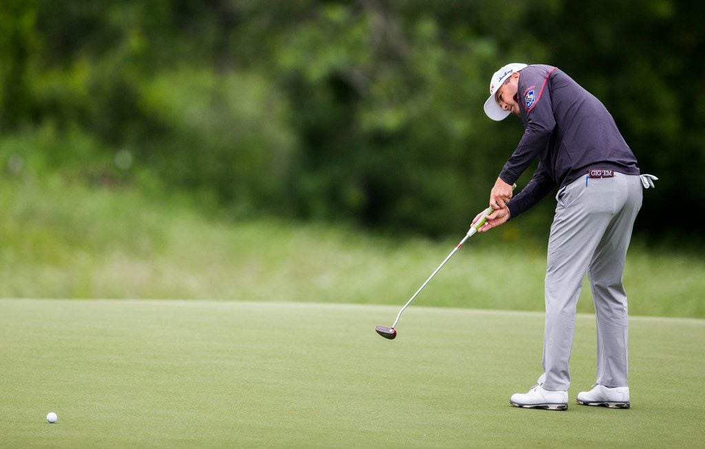 Ryan Palmer putts on the 15th green during round 2 of the AT&T Byron Nelson golf tournament...