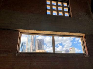 Long windows in the old Masonic building have a view of downtown.