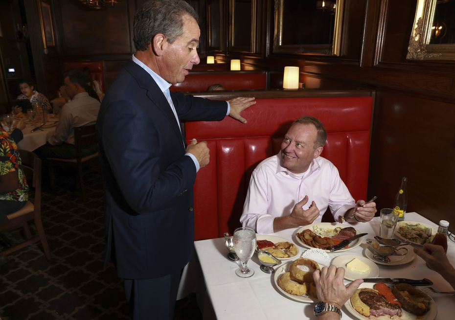 Bob's Steak and Chop House owner Bob Sambol talks with Michael McCoy, a regular customer....