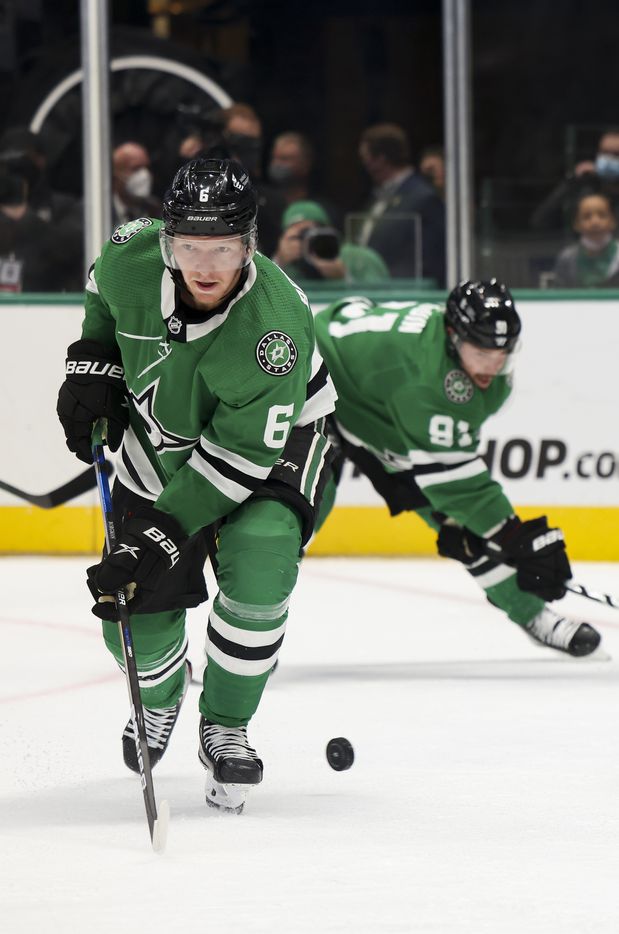 Dallas Stars defenseman Andreas Borgman (6) goes for the puck during the second period of a Dallas Stars preseason game against St. Louis Blues on Tuesday, Oct. 5, 2021, at American Airlines Center in Dallas. (Juan Figueroa/The Dallas Morning News)