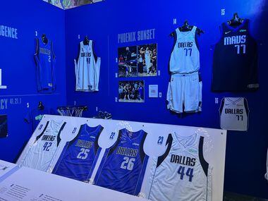 Mavericks jerseys of past and present on display at the Mavs vault exhibit at Fair Park’s...