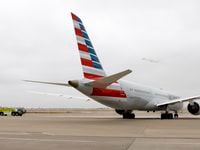 An American Airlines Boeing 787 Dreamliner at Terminal D of Dallas Fort Worth International...