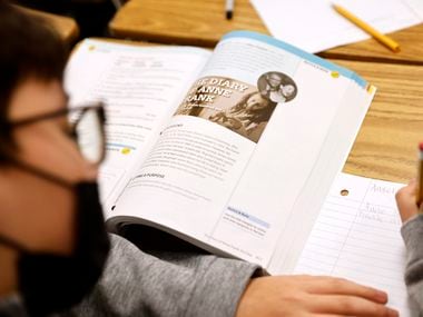 Eighth grade students take notes about The Diary of Anne Frank as Terrell ISD Superintendent...