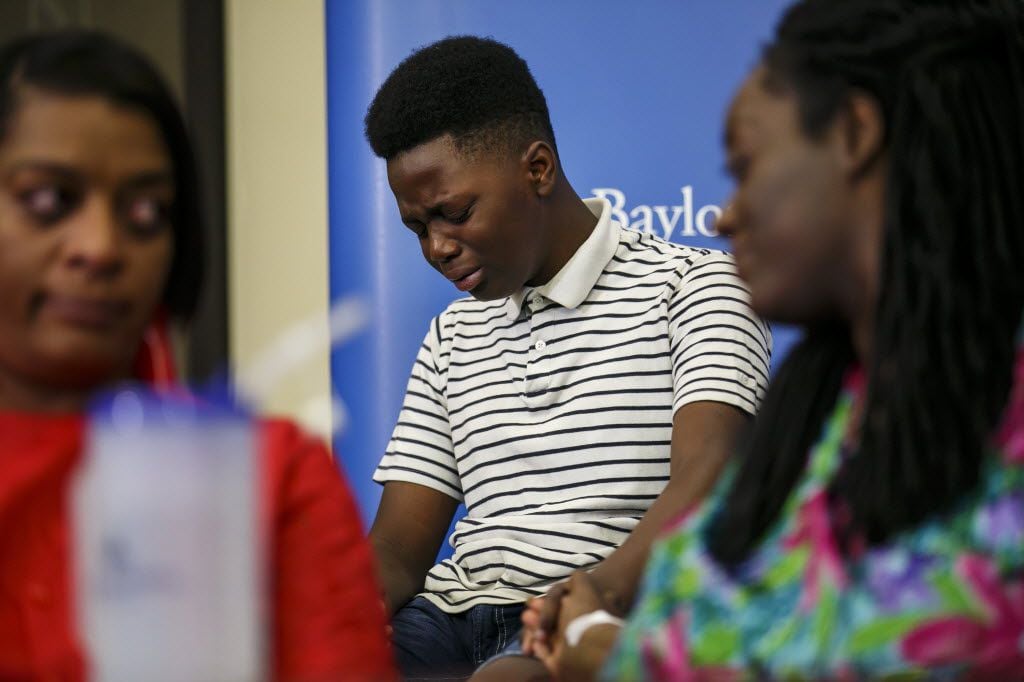 Jermar Taylor, 12, broke down as he recalled the confusion during the July 7 attack Thursday...