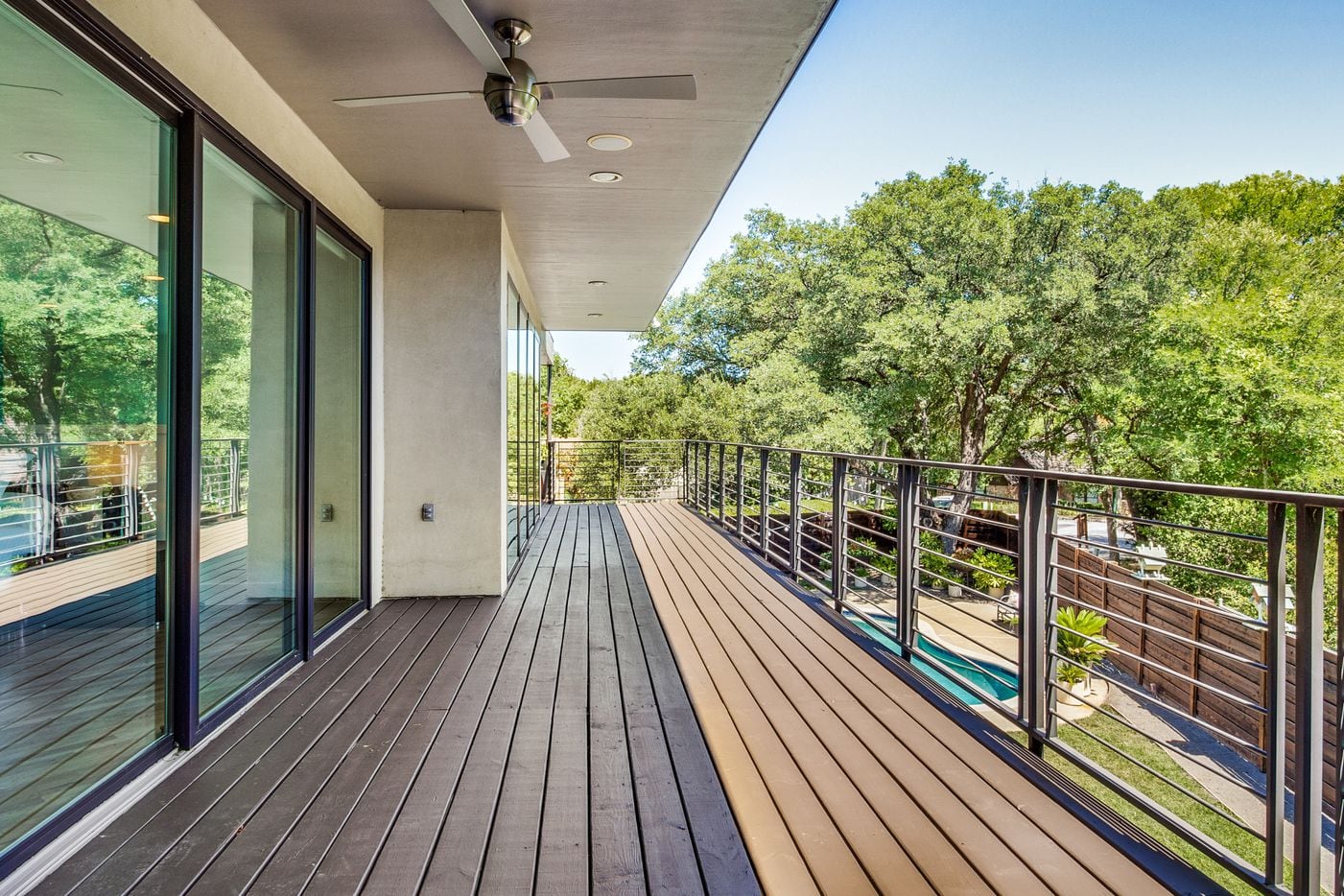 In Lake Highlands, a contemporary house with inexperienced views has two kitchen islands