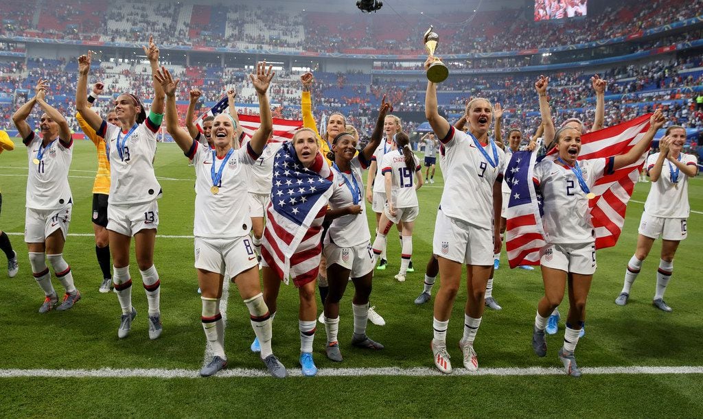 U.S. players celebrate their victory in the Women's World Cup final soccer match between...