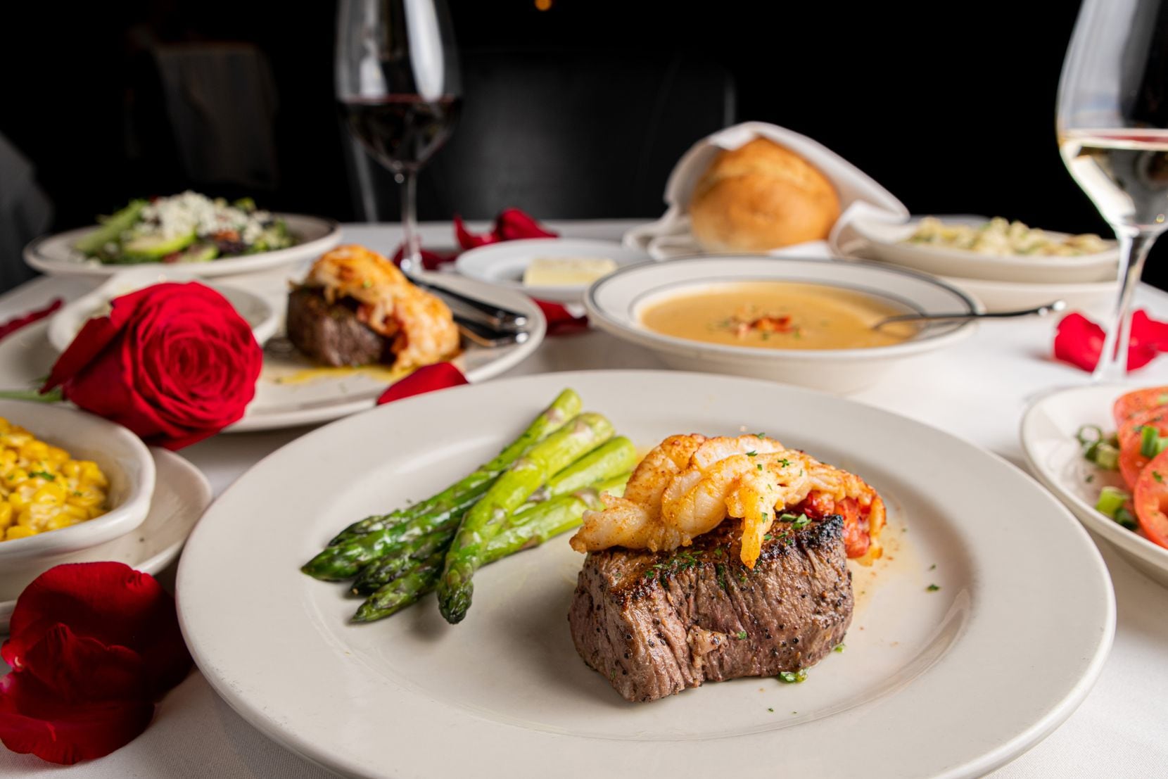 III Forks' Valentine's menu includes salted butter, vine-ripened tomatoes, filet mignon topped with cold water lobster tail with whipped potatoes and asparagus, lobster bisque, off-the-cob creamed corn and III Forks salad.