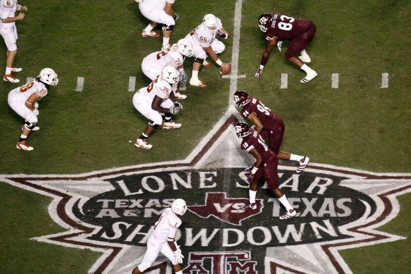 Texas Longhorns offensive linesman Nick Zajicek (55) lines up in formation against the...