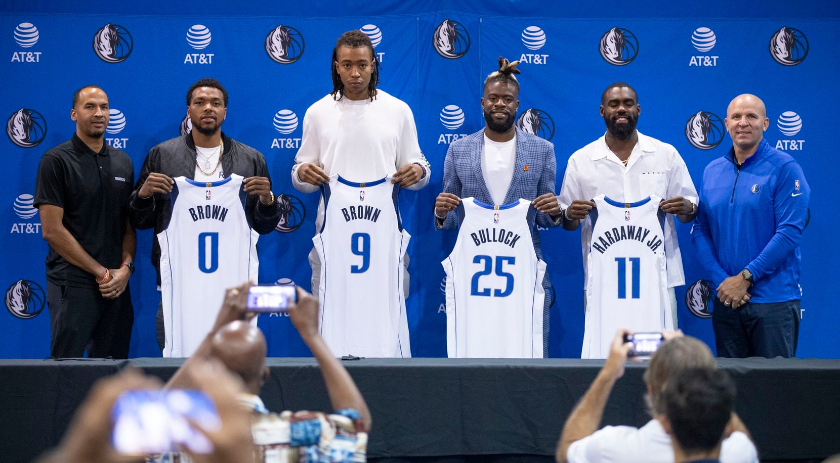 (L to R) Dallas Mavericks General Manager Nico Harrison, forwards Sterling Brown, Moses Brown, Reggie Bullock, guard Tim Hardaway Jr. and head coach Jason Kidd pose for a photo during a press conference in Dallas, Friday, August 27, 2021. (Brandon Wade/Special Contributor)