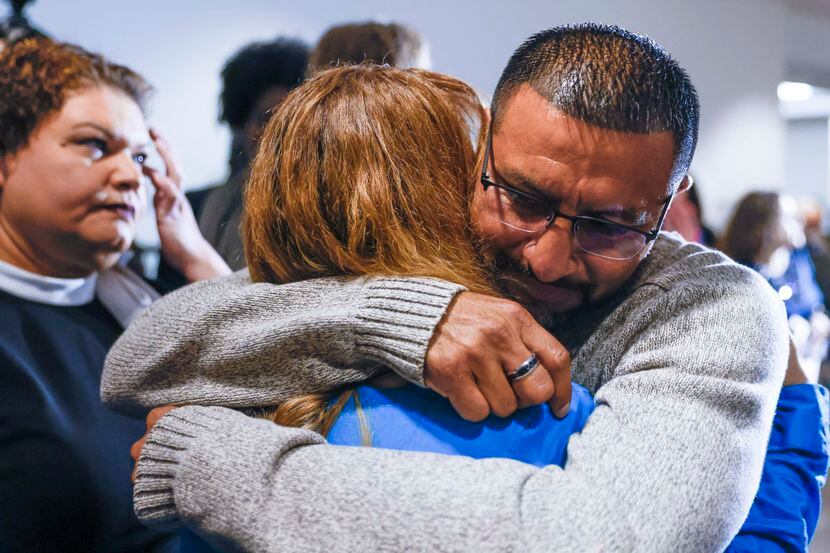 Martin Santillan embraces longtime friend Angie Bell after he was formally exonerated of a...