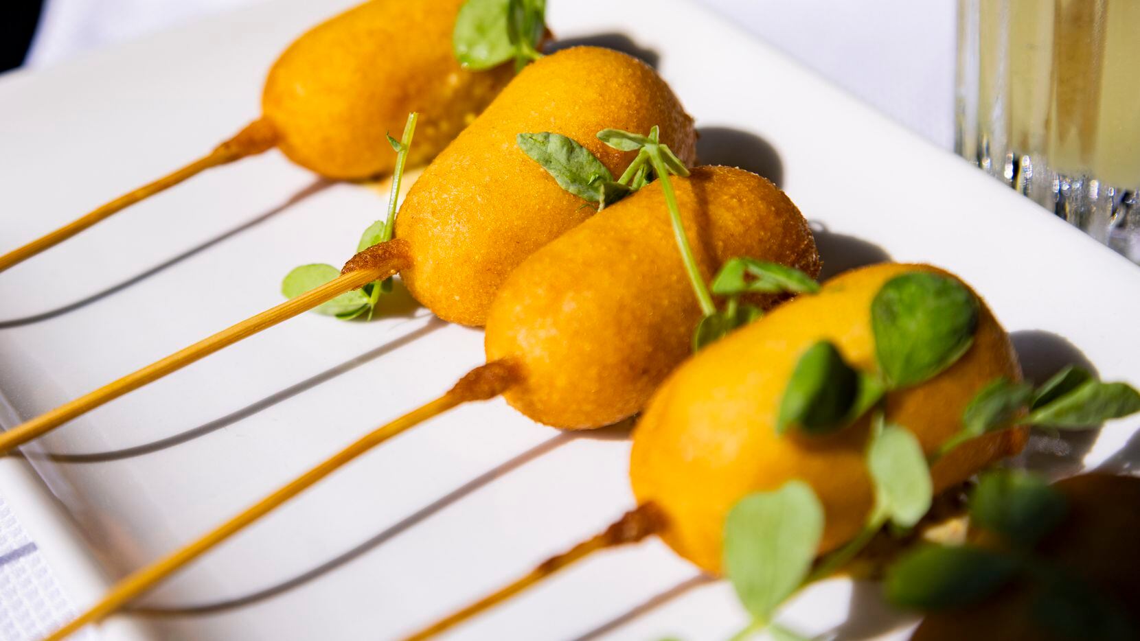 Corn dogs, but make them fancy? At Stillwell’s, inside the new Hotel Swexan, the corny dogs...