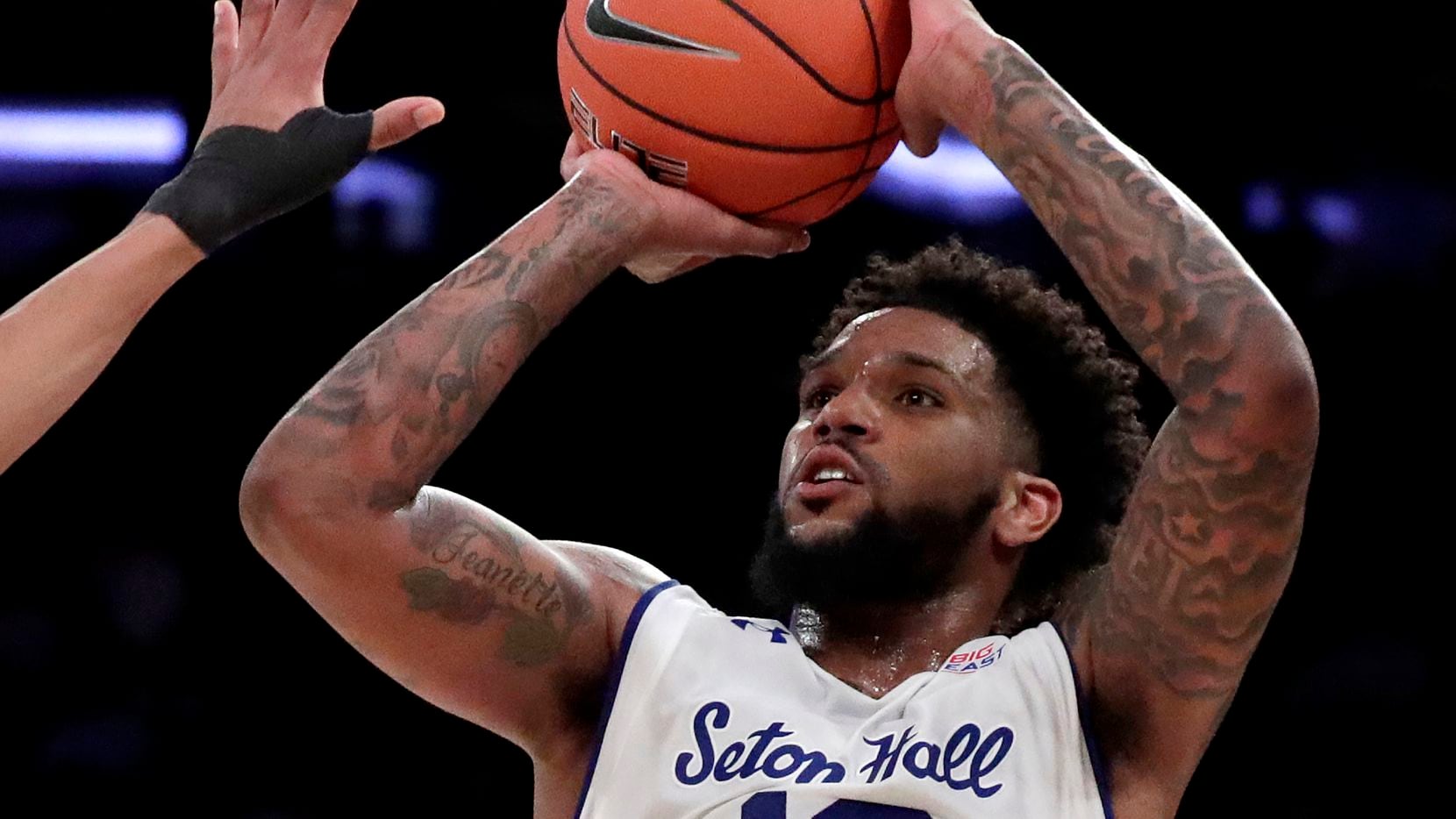 FILE - In this March 14, 2019, file photo, Seton Hall guard Myles Powell (13) shoots against...