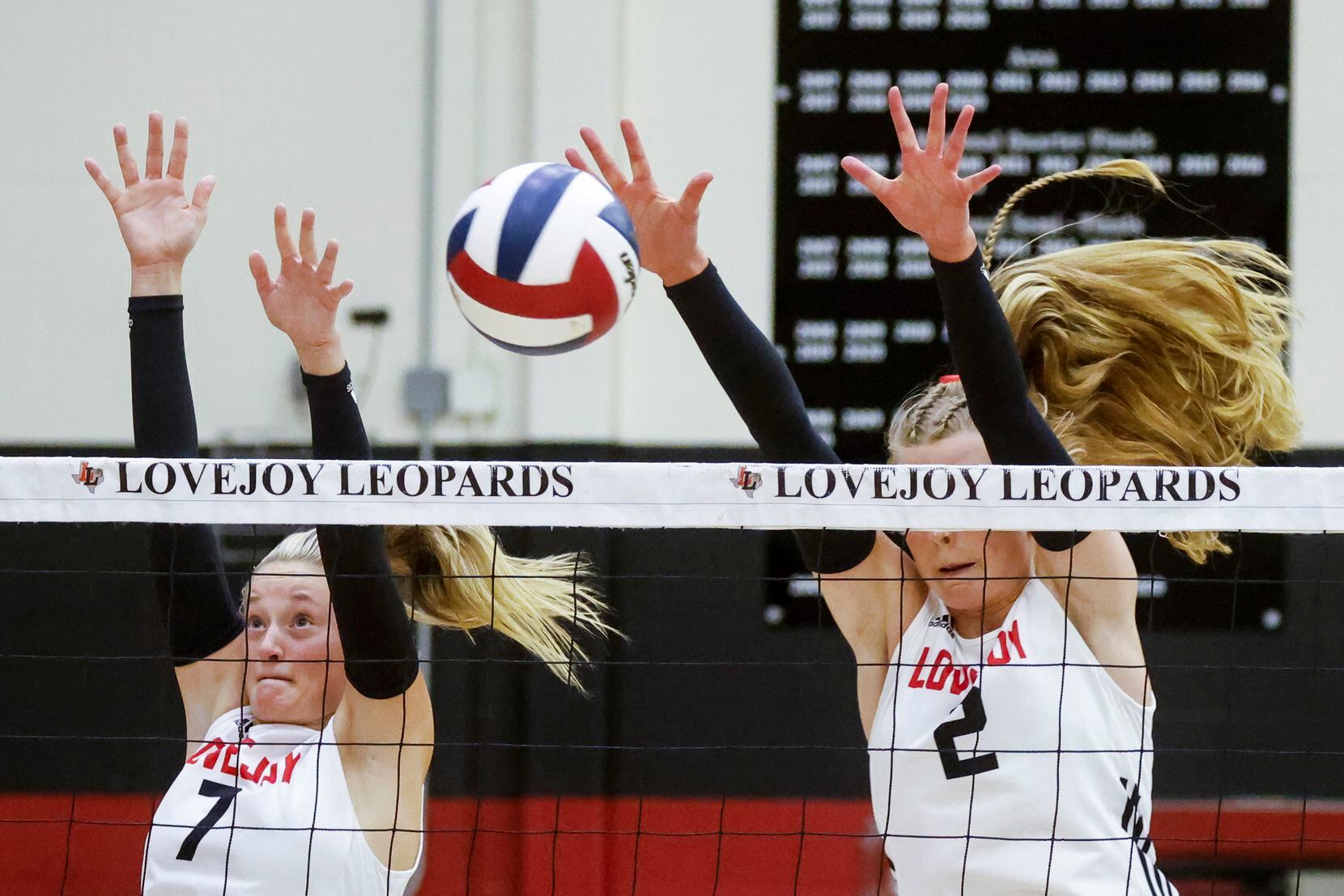 Lovejoy’s SadieJane Hand, left, and Shelby Burriss attempts to block a shot against Prosper...