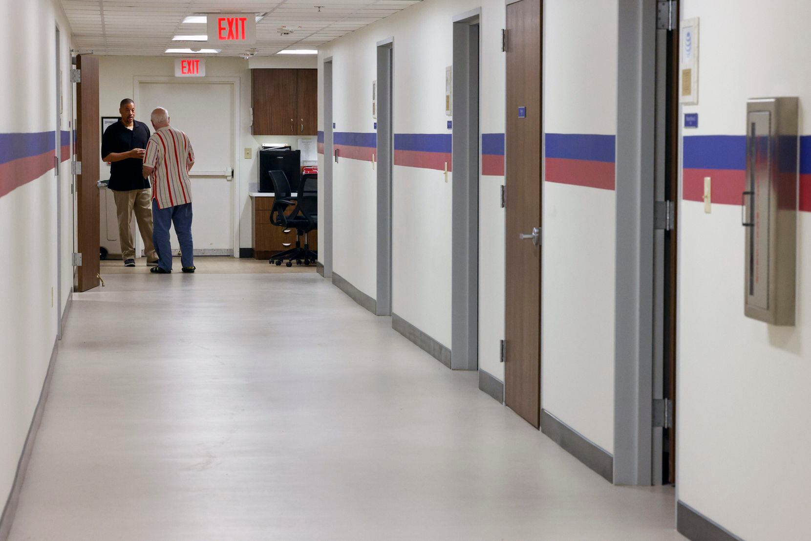 Client rooms line a hallway at The Dallas Deflection Center in Dallas, Wednesday, March 1,...
