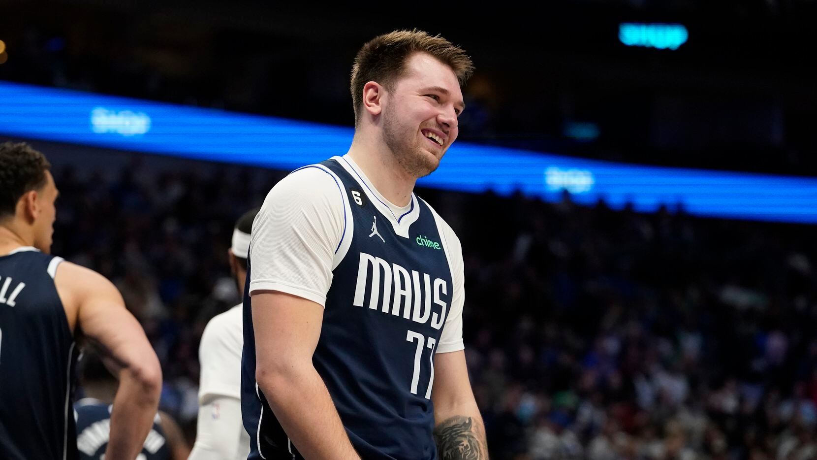 Dallas Mavericks guard Luka Doncic (77) reacts to a foul called against him during the first...