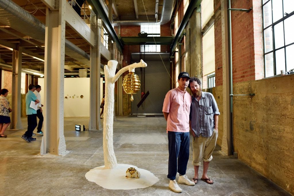 Artists Gabriel Rico, left, and Jeff Gibbons, with Rico's art piece titled "Crudelitatem (I...