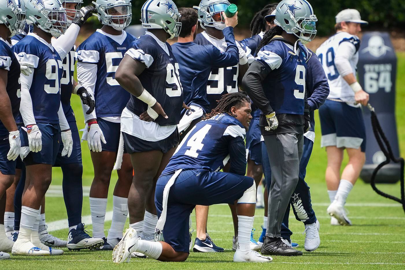 Dallas Cowboys defensive end Randy Gregory (94) takes a knee between drills during a minicamp practice at The Star on Tuesday, June 8, 2021, in Frisco.