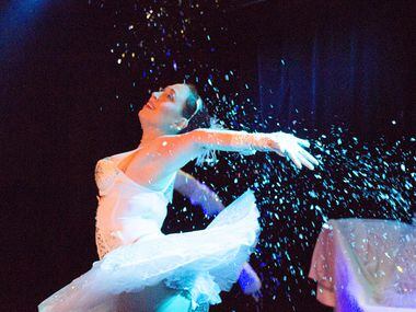 Snow Queen Ella Ardour dances in glitter at the 5th annual Nearly Naked Nutcracker.
