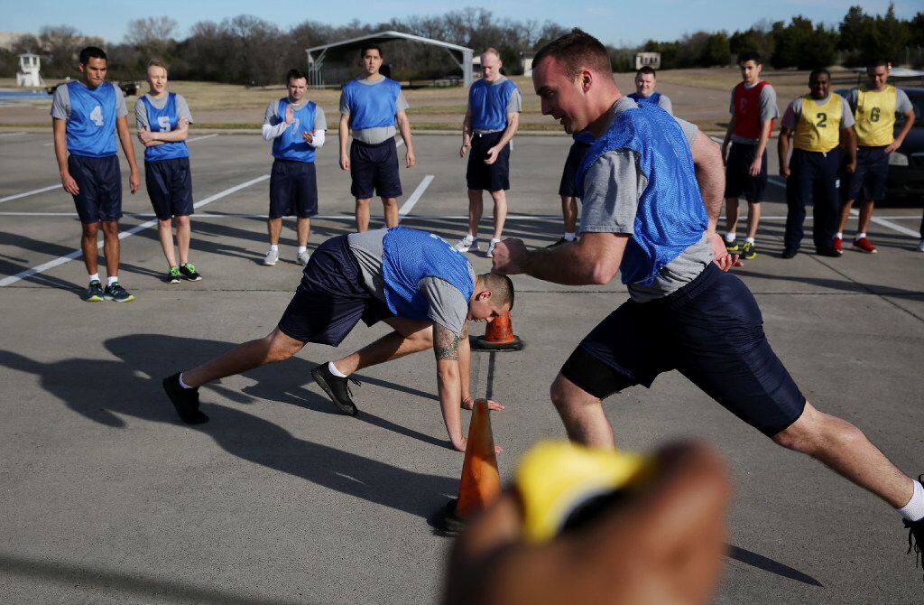 Robert Schmidt (front right) joins other recruits as they run an agility test during the...