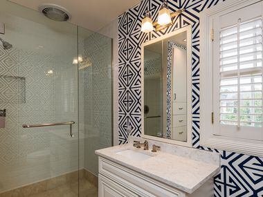 Bathroom with printed accents at 5845 Lupton Drive.