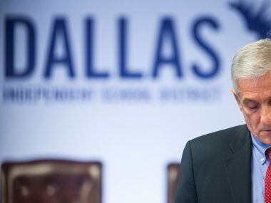 Dan Micciche, vice president of the Dallas ISD Board of Trustees, talks at a press...