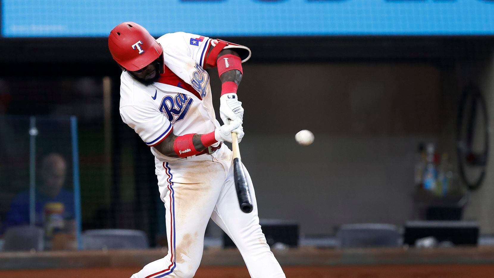 Texas Rangers batter Adolis Garcia connects on a two-run homer, a new Rangers rookie record...