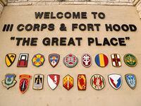 A sign at the Bernie Beck Gate welcomes people to the Fort Hood military base in Killeen,...