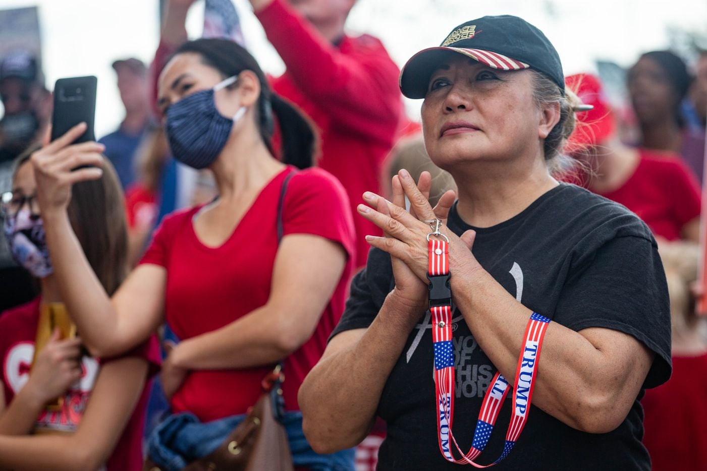 Francesca Geisenhoff listens during an America is Great rally hosted by TrumpTrain 2020 DFW...