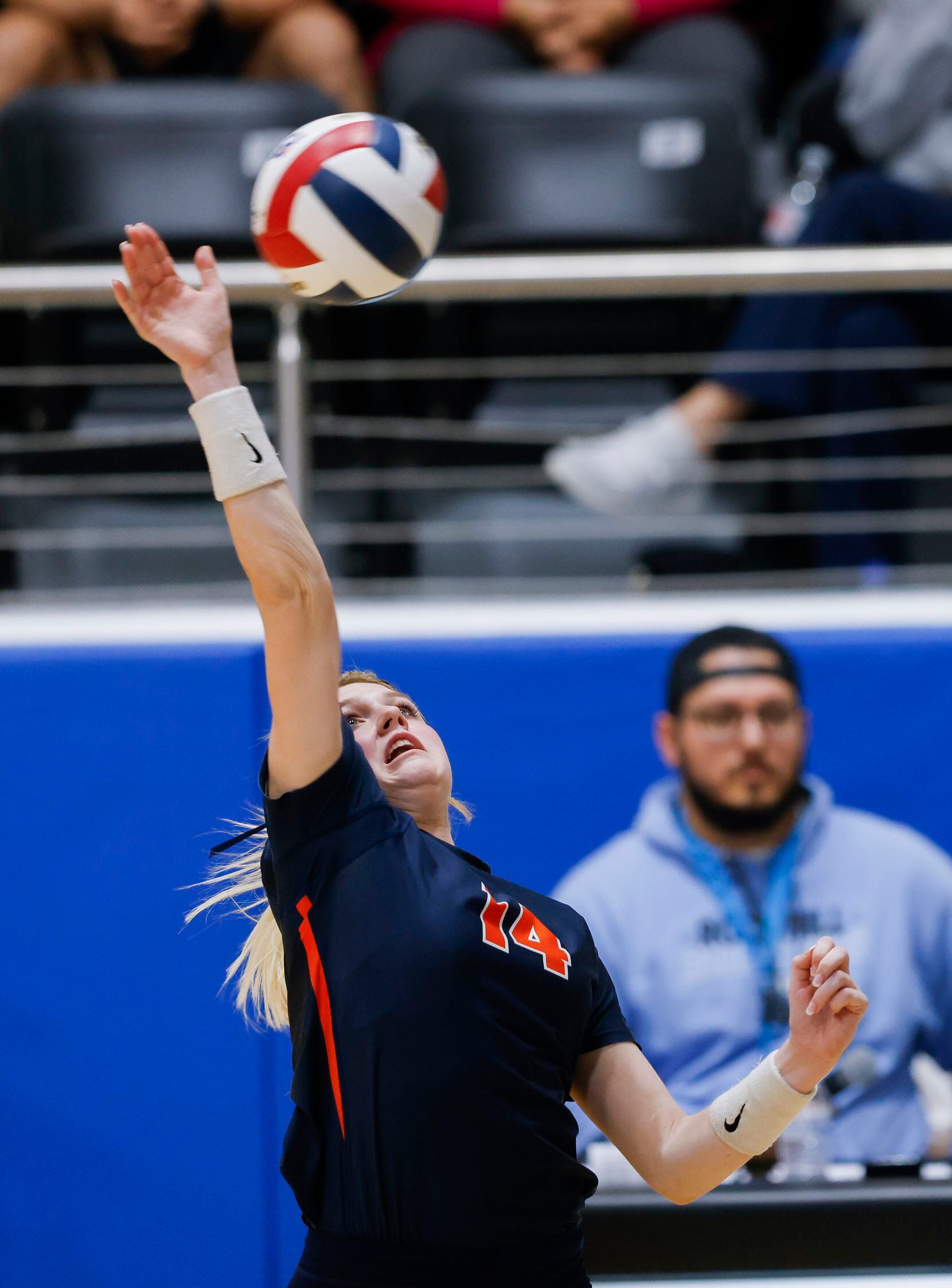 Frisco Wakeland’s Elyse Niemann (14) hits the ball against Frisco Reedy during the first set...