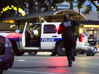 Dallas Police respond after shots were fired at a Black Lives Matter rally in downtown...