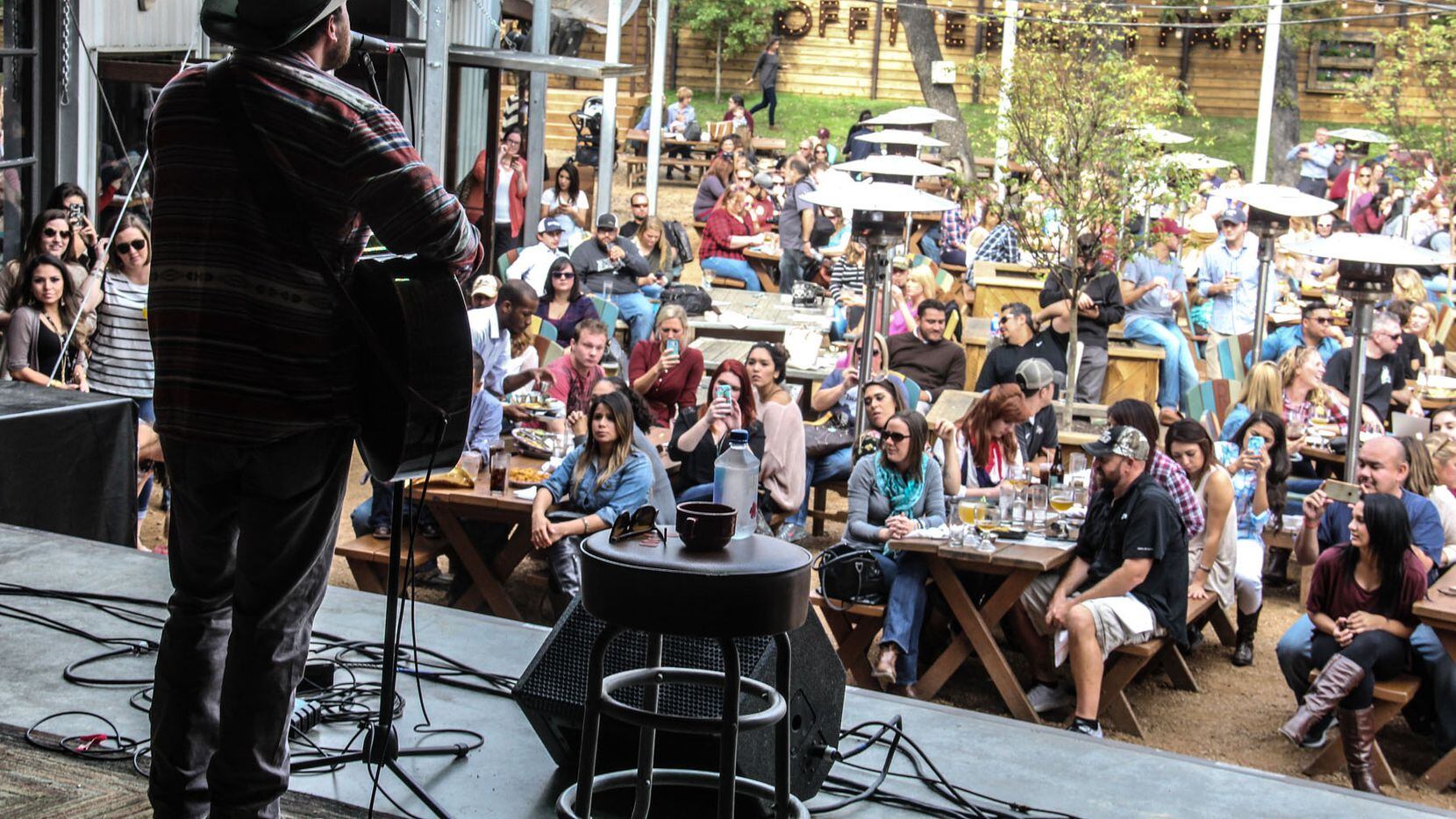 The Rustic in Uptown Dallas has a patio that'll suit nearly anyone: There's a giant bar, a...