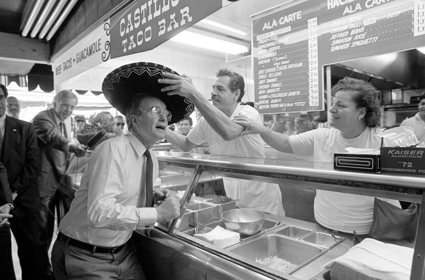 1988: Vice President George Bush dons a sombrero while campaigning at the Farmers Market in...