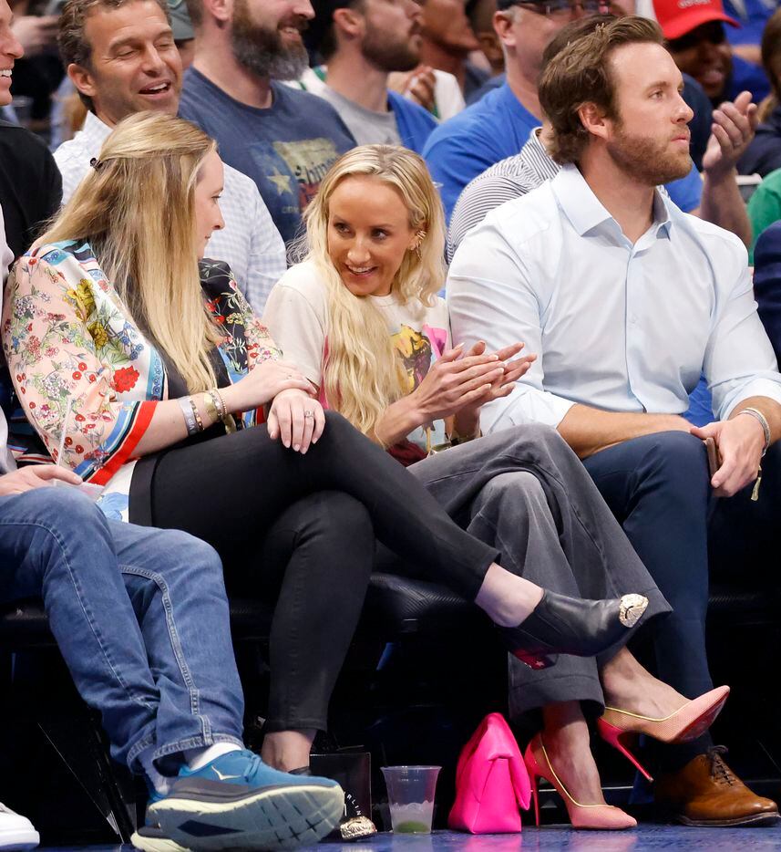Olympic gold medal gymnast Nastia Liukin sitting visit sis during the second quarter in Game...