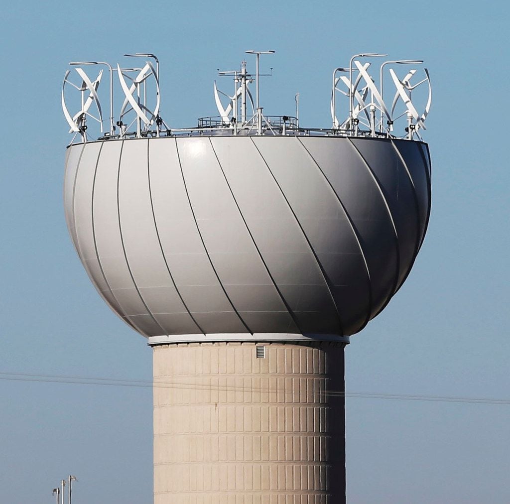 Wind turbines on top of a water tower in Addison were supposed to be a merger of art and...